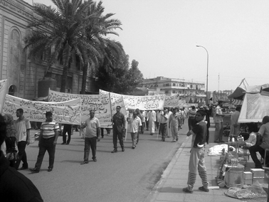 Banners at 2012 May Day march in Basra, Iraq