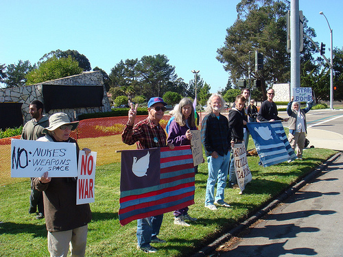 Demonstrators line the highway outside the Vandenberg Air Force Base main gate near Lompoc, Calif. Photo: Jim Haber