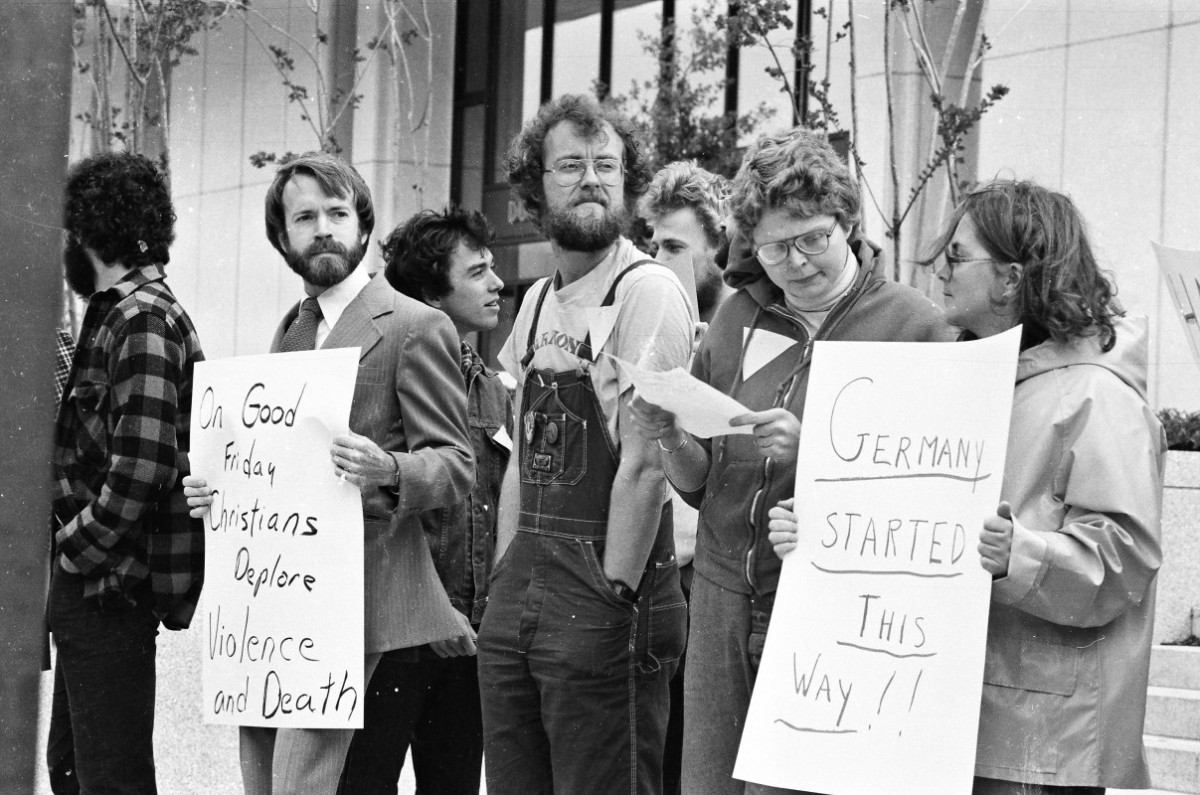 WRL Southeast organizer Steve Sumerford (front row, third from left) with other vigil participants in Durham, North Carolina after the 1981 anti-gay murder of Ronald “Sonny” Antonevich at Little River in north Durham. The killing sparked the organizing for “Our Day Out”--the Triangle’s first lesbian and gay Pride march. Image NCC_0107_0206, Little River beatings protests, Oversize Box 8, Allan Troxler papers, LGBTQ+ Community collection (NCC.0107), North Carolina Collection, Durham County Library, NC.