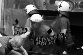 Riot Police beating old man in Athens demonstration
