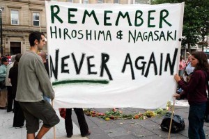 Banner: Remember Hiroshima & Nagasaki: Never Again