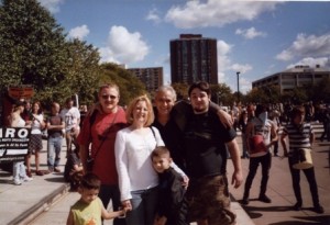 Tod Ensign (center) with Different Drummer staff and family members at an antiwar rally in Syracuse in 2007.