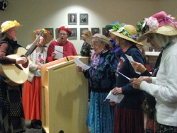 Raging Grannies sing against recruitment before being forced to stop by the Board of Education. Photo by Gloria Williams.