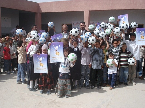 During the Week of Nonviolence, La’Onf members gave schoolchildren in Samawah, Muthanna Province, soccer balls in exchange for violent toys. Photograph courtesy of La’Onf.