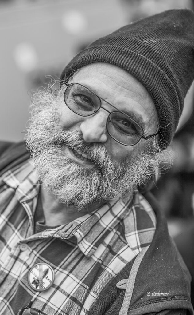 Ever the dedicated activist, John is shown here staffing the War Resisters League literature table following the April 2015 antinuclear weapons march from Union Square to Dag Hammarskjold Plaza across from the United Nations. photo by Ed Hedeman